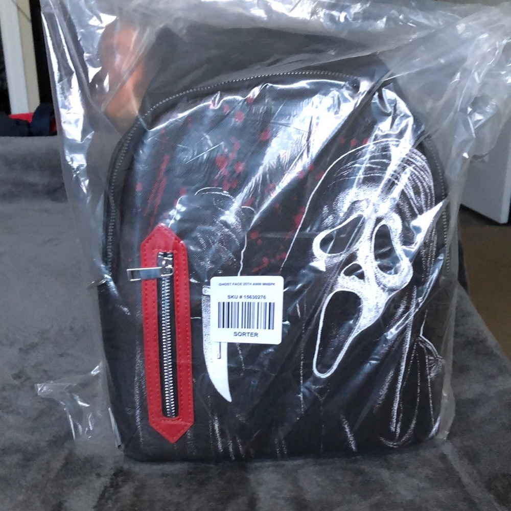 What’s your favorite scary movie …. 25th anniversary ghost face mini bag! , new